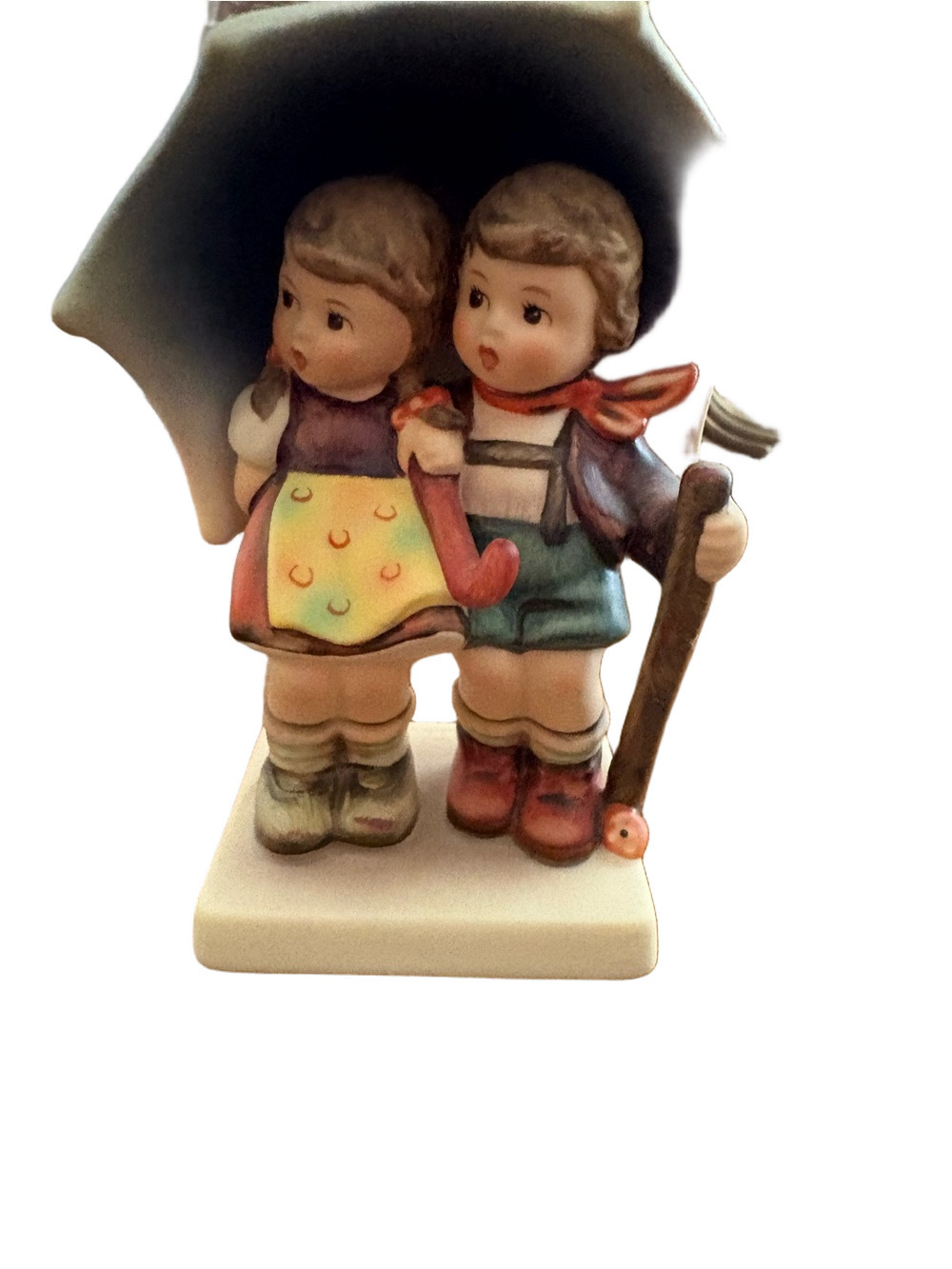 Authentic M.I. Hummel Stormy Weather porcelain figurine manufactured by Goebel